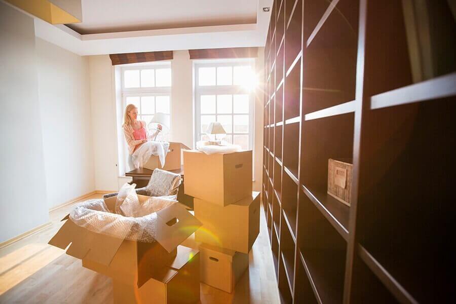 Lady Packing up boxes